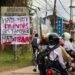Keselamatan Jalan Dipertanyakan, Warga Kutim Pasang Spanduk Kritik Bus Perusahaan